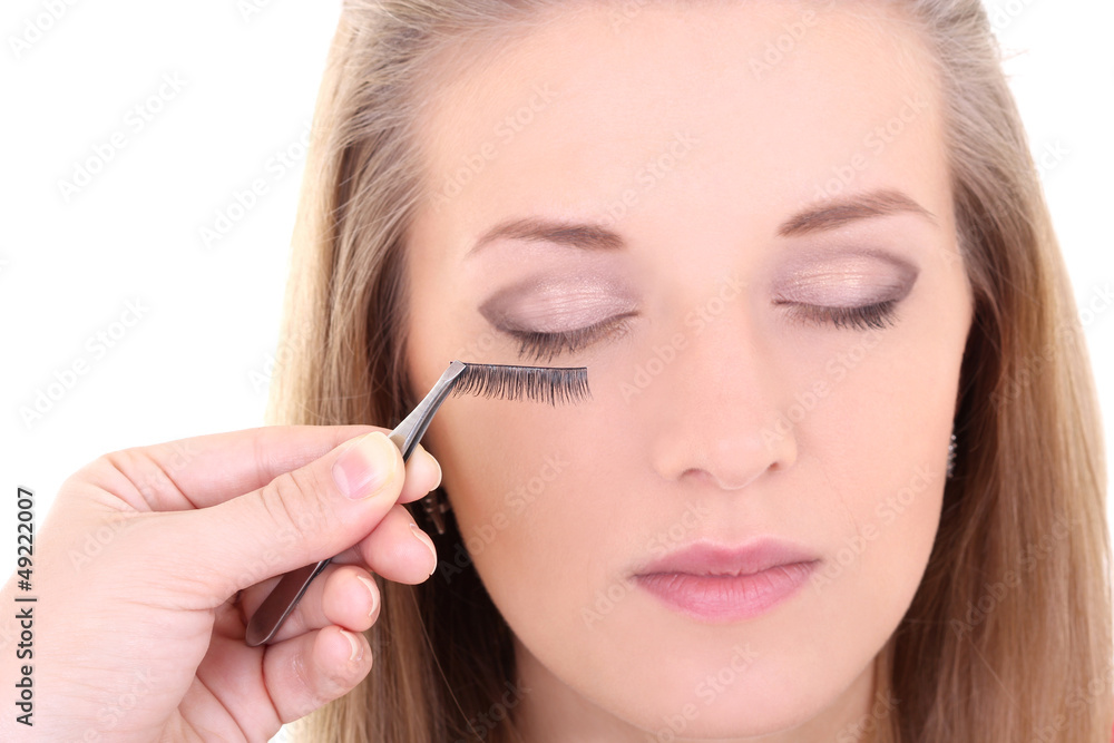 young blondie woman with artificial eyelashes young blondie woman with artificial eyelashes