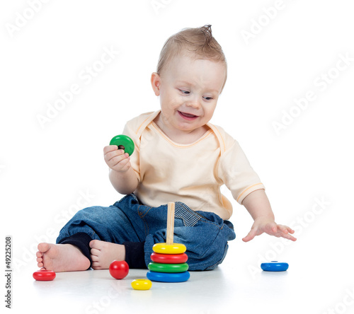 happy baby boy playing with...