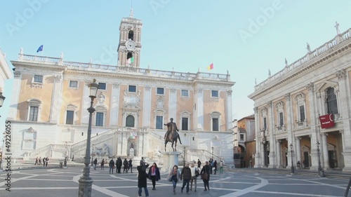 tourists at Palazzo Senatorio on a sunny day in Rome, Italy photo