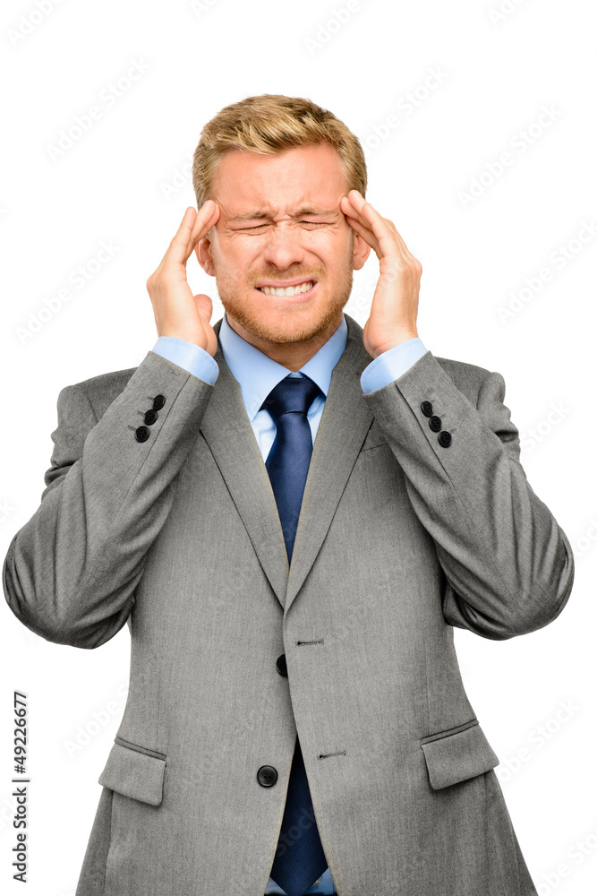 Worried young businessman suffering from headache Worried young businessman suffering from headache