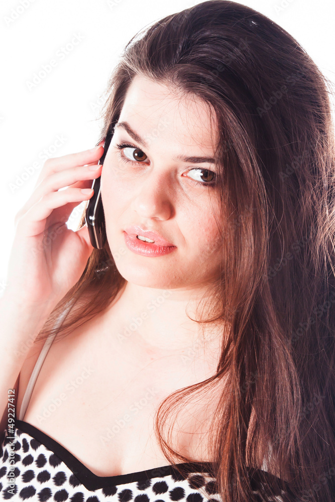 Fototapeta premium beautiful and young woman on the phone