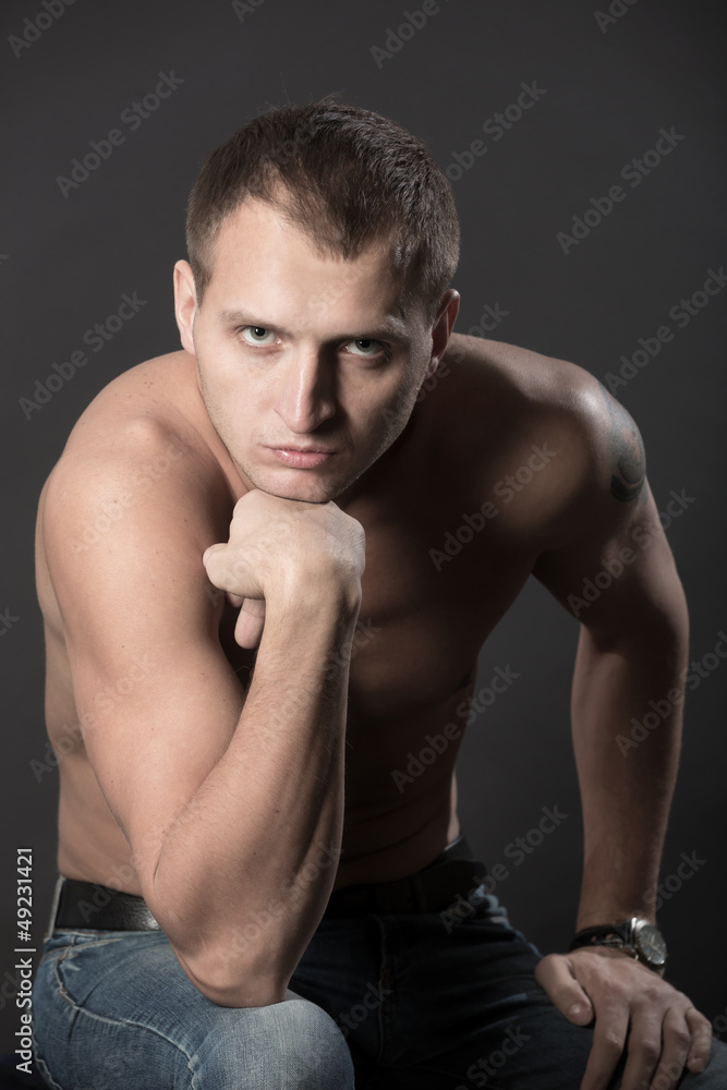 Portrait of the man on a black background