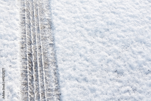 Tyre tread in the snow © stocksolutions