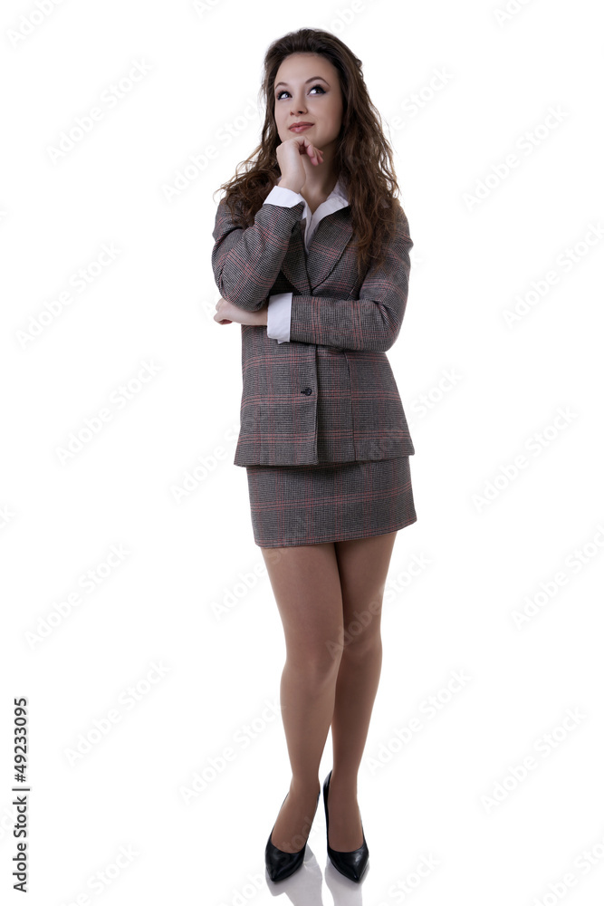 Gorgeous businesswoman in suite thinking isolated on white full Gorgeous businesswoman in suite thinking isolated on white full