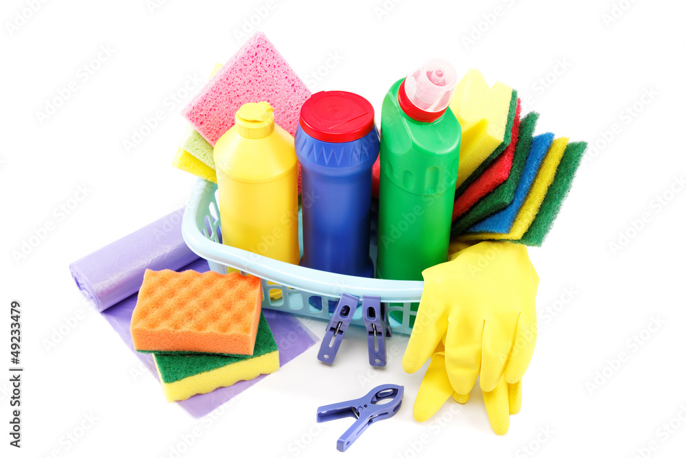 Detergent bottles, rubber gloves and cleaning sponge on a white Detergent bottles, rubber gloves and cleaning sponge on a white