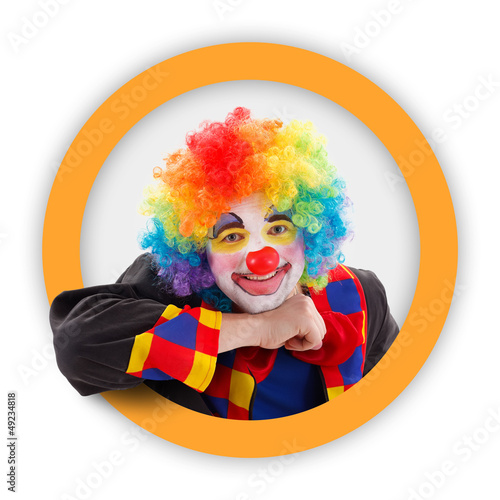 Clown in round orange frame