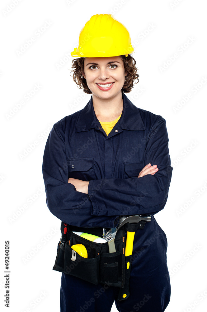 Confident female worker posing with arms crossed Confident female worker posing with arms crossed