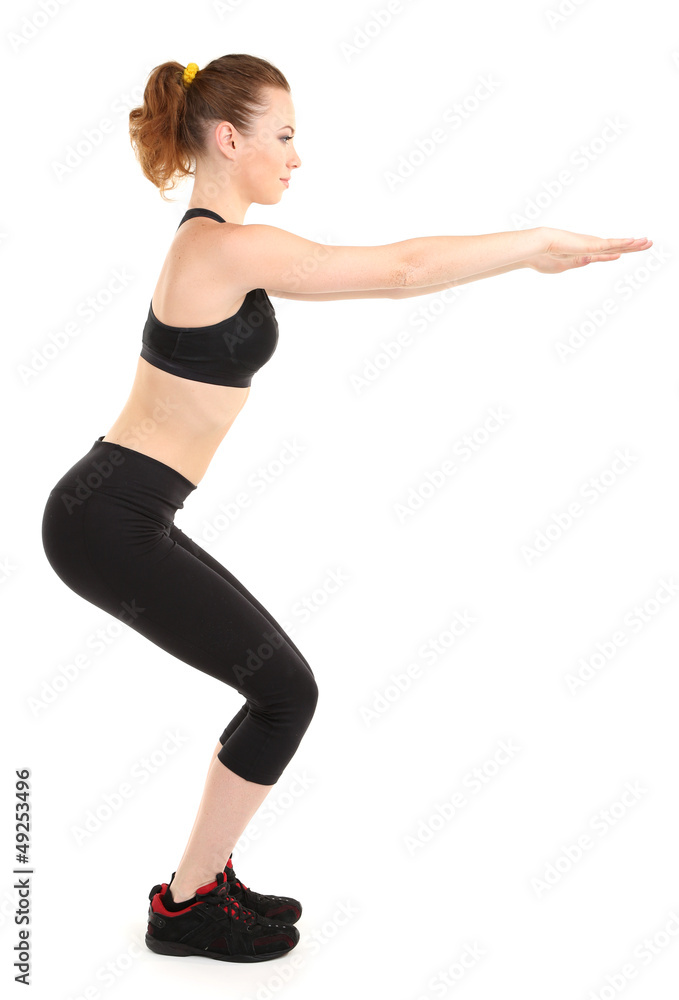 Young woman doing fitness exercises isolated on white Young woman doing fitness exercises isolated on white