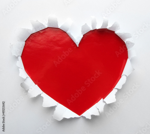 Beautiful torn paper in heart shape symbol
