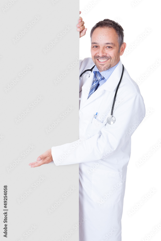 Portrait Of A Doctor Holding Blank Placard Portrait Of A Doctor Holding Blank Placard