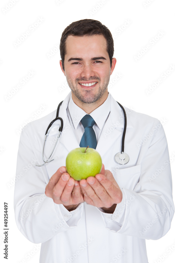 Male Doctor Holding Green Apple Male Doctor Holding Green Apple