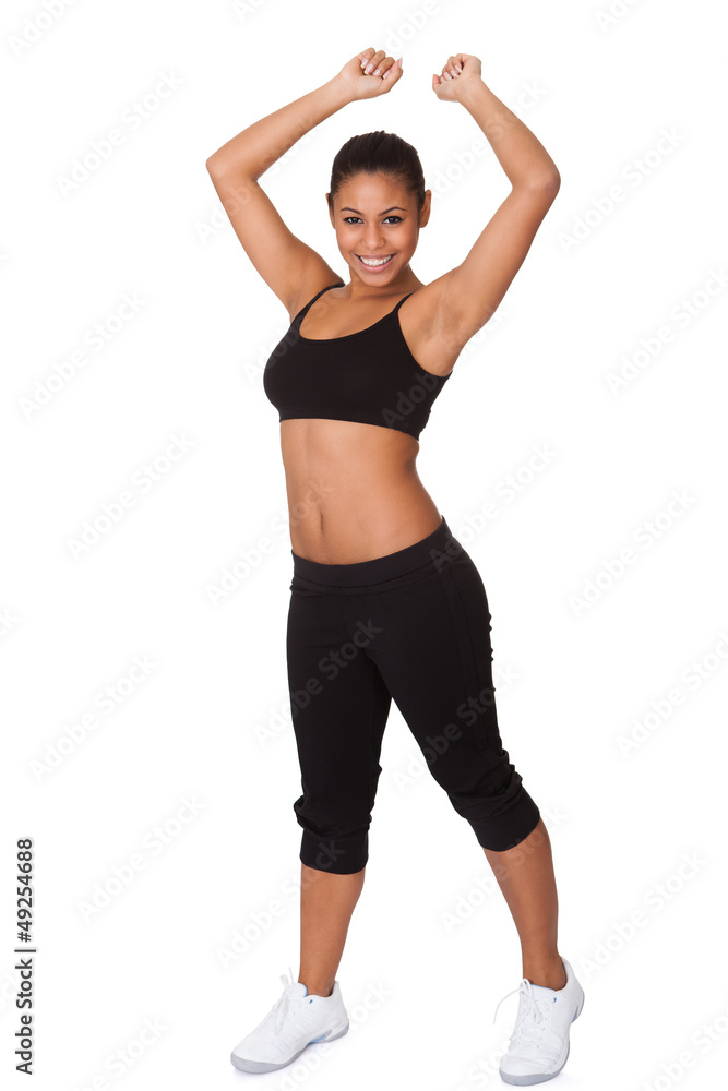 Portrait Of Excited Young Woman Jumping Portrait Of Excited Young Woman Jumping