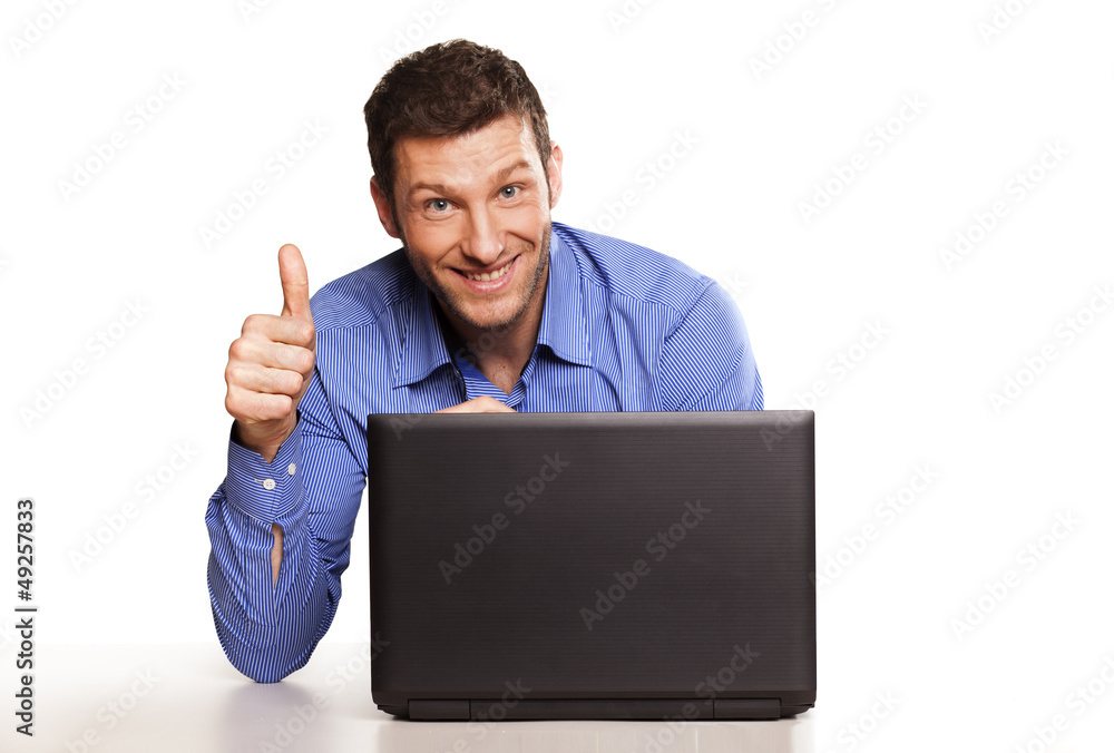Attractive businessman With Laptop, Pointing A Finger Attractive businessman With Laptop, Pointing A Finger