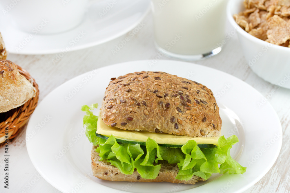 bread with cheese and lettuce on the plate bread with cheese and lettuce on the plate