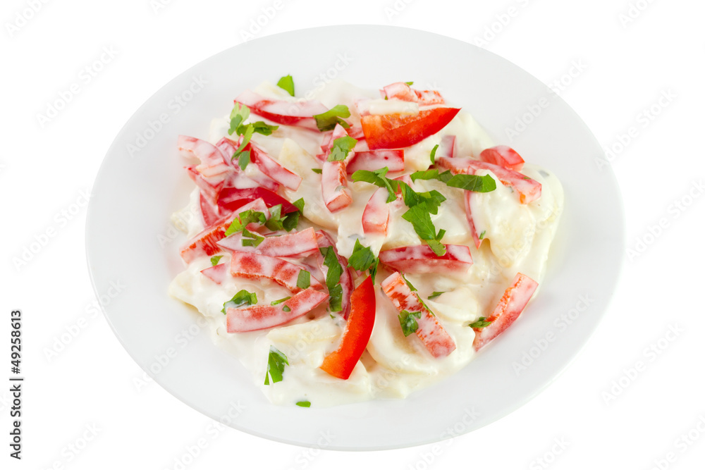 salad with potato, pepper, mayonnaise on the plate salad with potato, pepper, mayonnaise on the plate