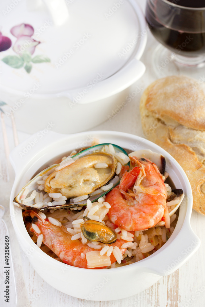 rice with shrimps and mussels in the bowl rice with shrimps and mussels in the bowl