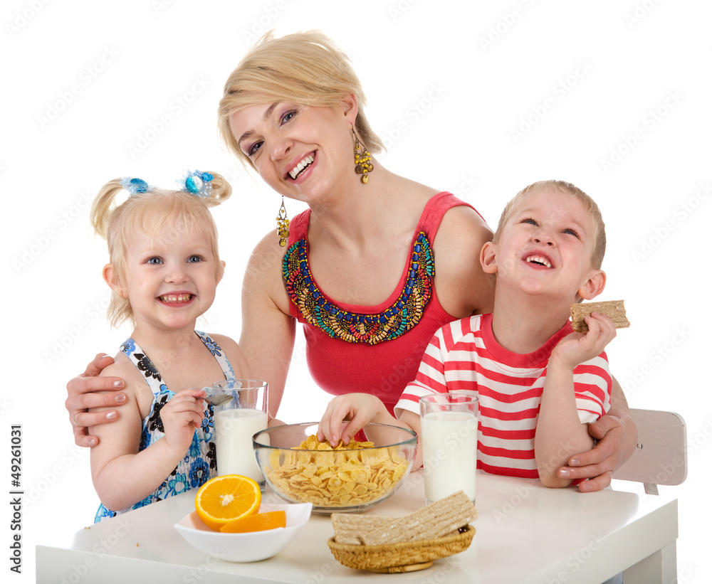 Happy family having breakfast. isolated on white Happy family having breakfast. isolated on white