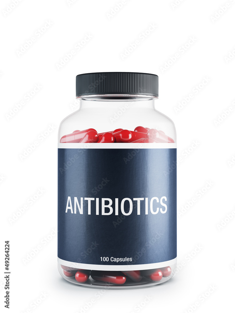 Antibiotics transparent bottle with red pills inside Antibiotics transparent bottle with red pills inside
