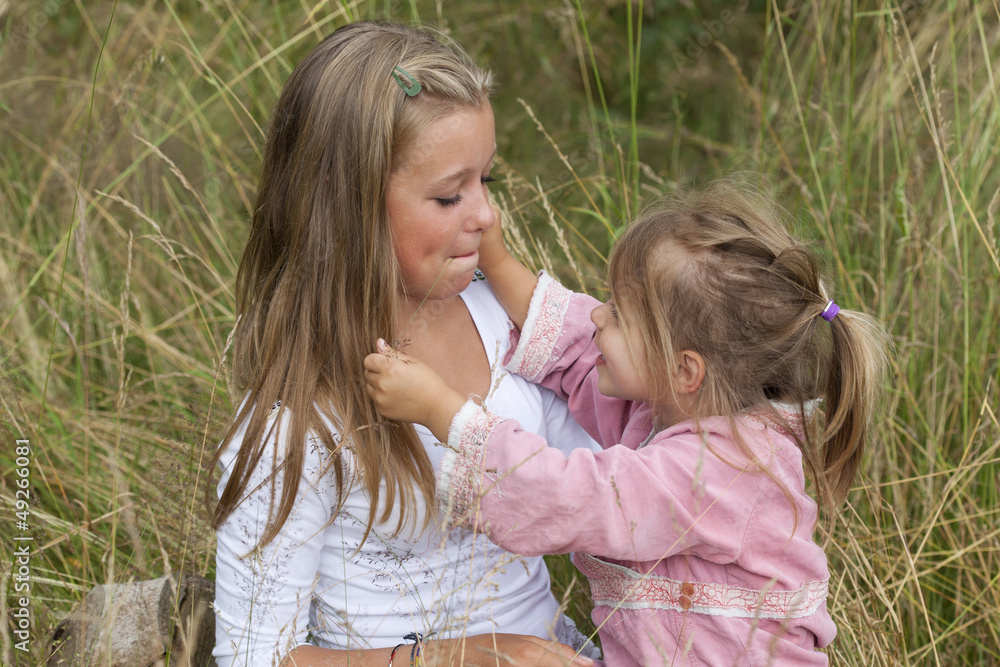Two girls are aving a good time together. Two girls are aving a good time together.