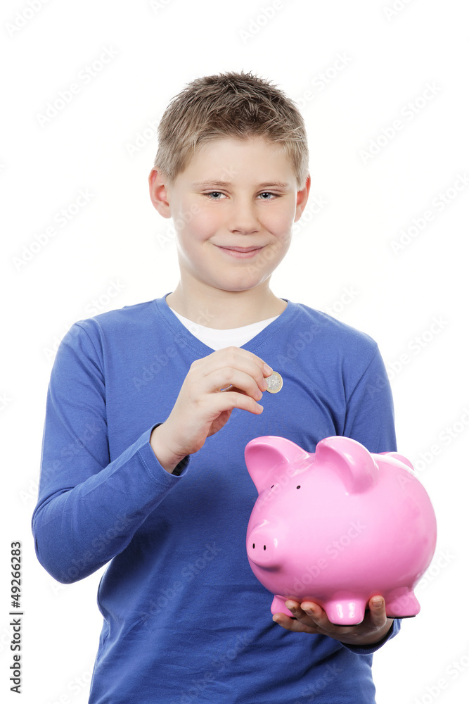 boy saving money in a piggybank boy saving money in a piggybank