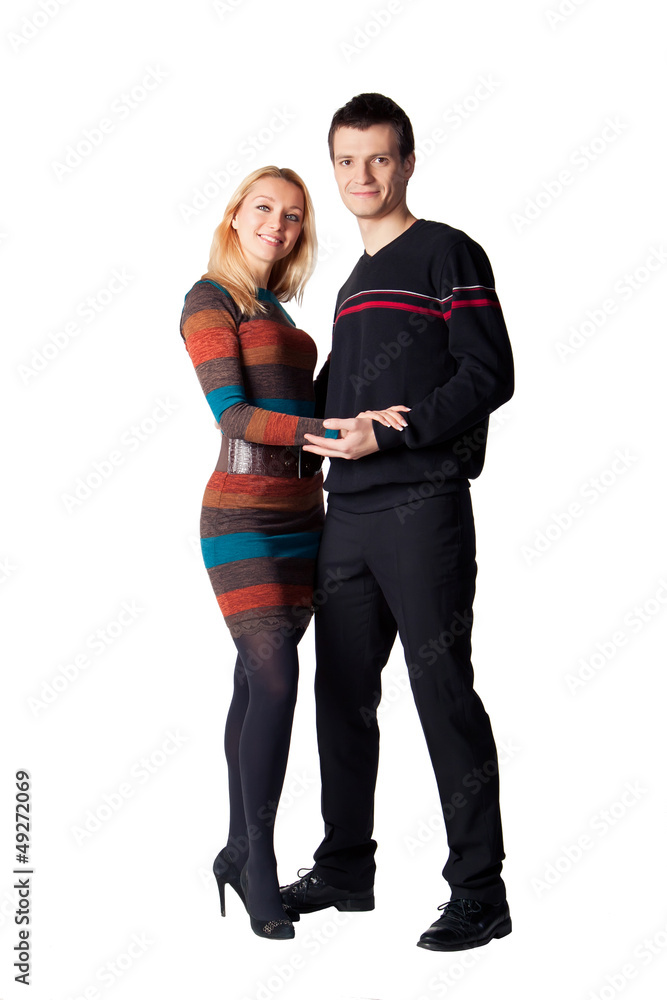 Young couple standing together on white Young couple standing together on white
