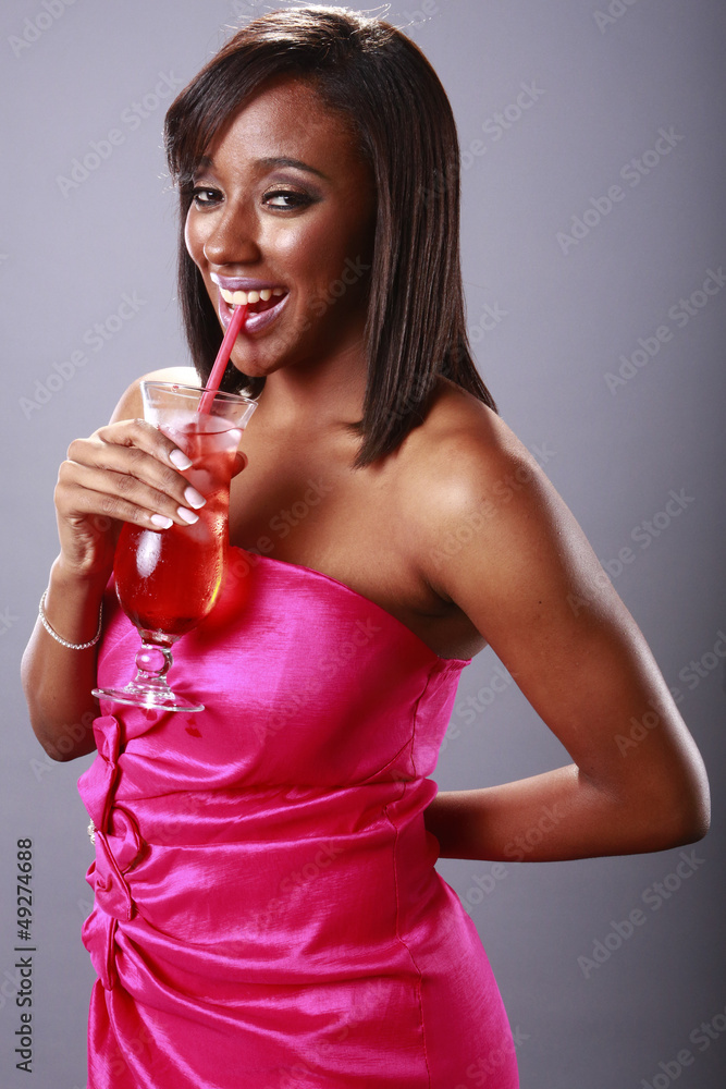 Magenta girl enjoys a red cocktail Magenta girl enjoys a red cocktail