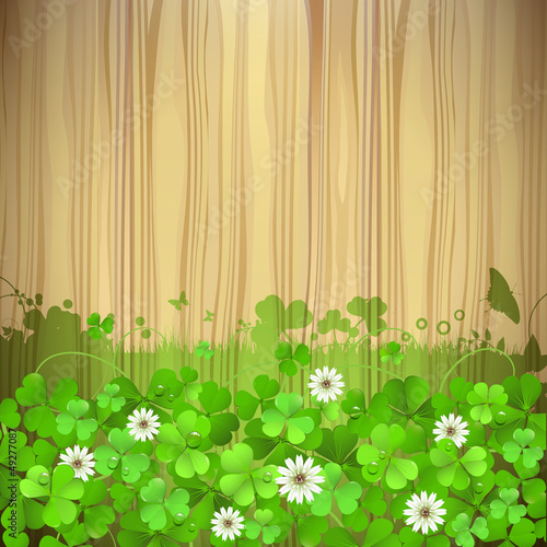 Wood background with clover