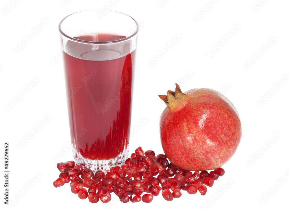 pomegranate and pomegranate juice on a white background pomegranate and pomegranate juice on a white background