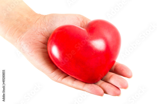 Heart in hands as love and health symbol
