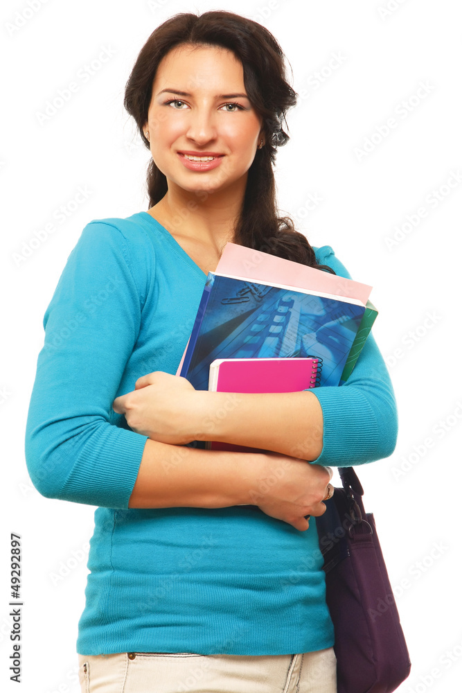 Young teenage girl holding books Young teenage girl holding books