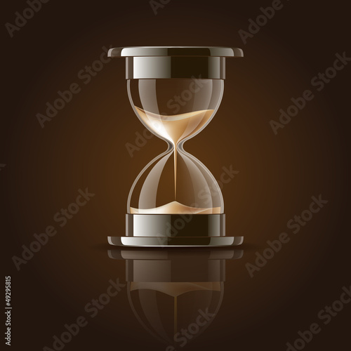 Sand falling in the hourglass.