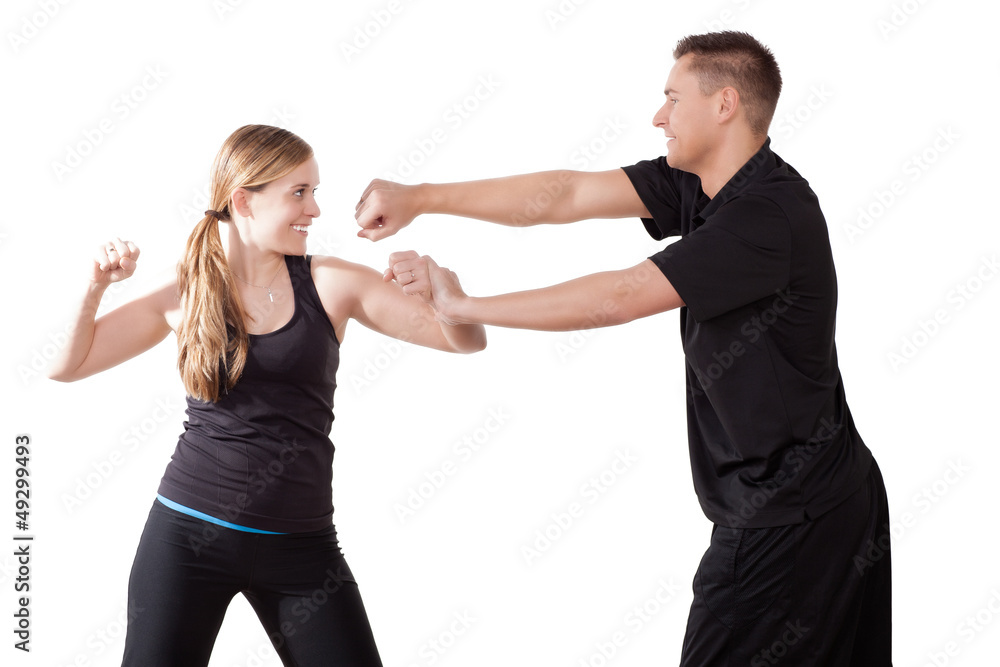 Two kick boxers training together