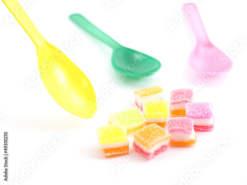 Colorful sweet jelly and spoons