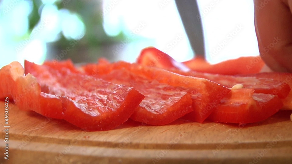cutting pepper salad in the kitchen, close-up 2 cutting pepper salad in the kitchen, close-up 2