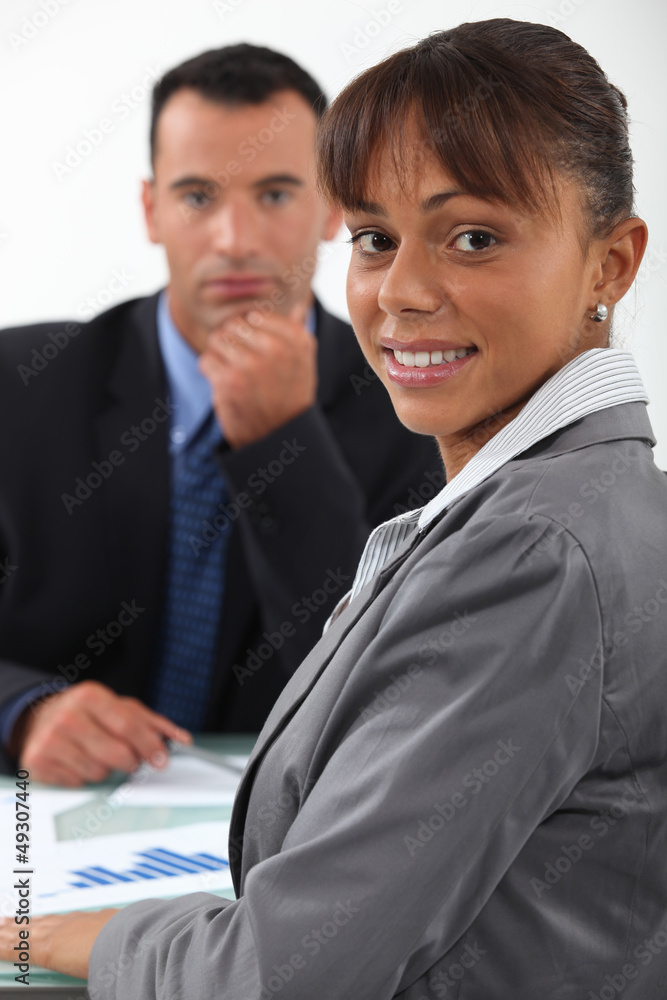 businessman and businesswoman having a discussion businessman and businesswoman having a discussion