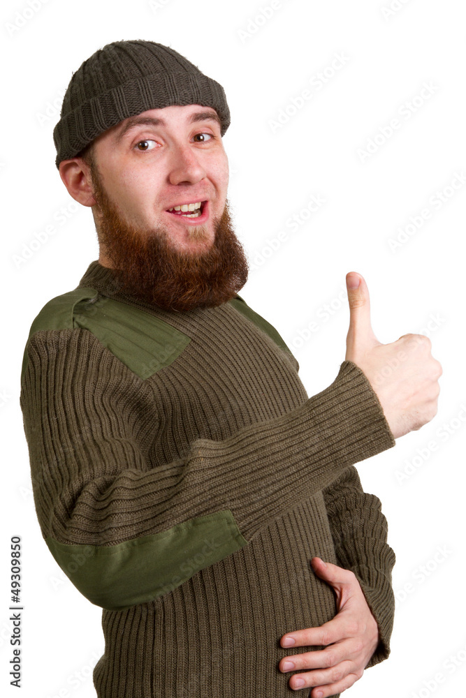 Portrait of an excited young guy showing a success sign isolate Portrait of an excited young guy showing a success sign isolate