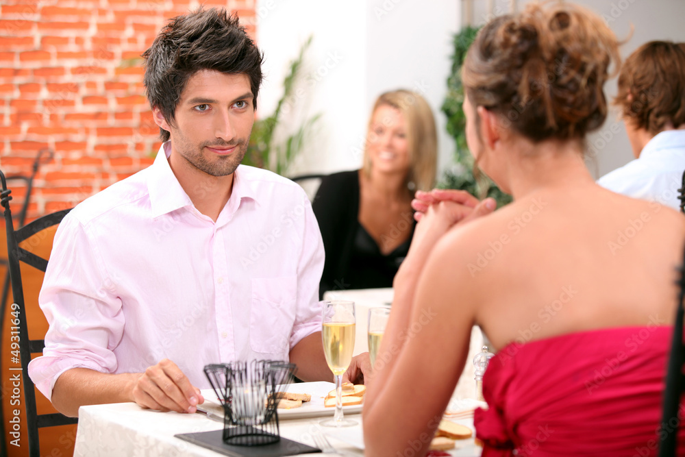 Couple dining in restaurant