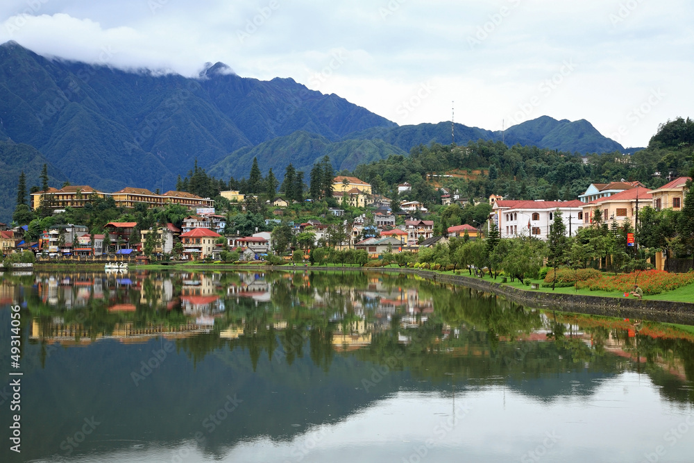 Sapa cityscape with reflection on the lake in Vietnam