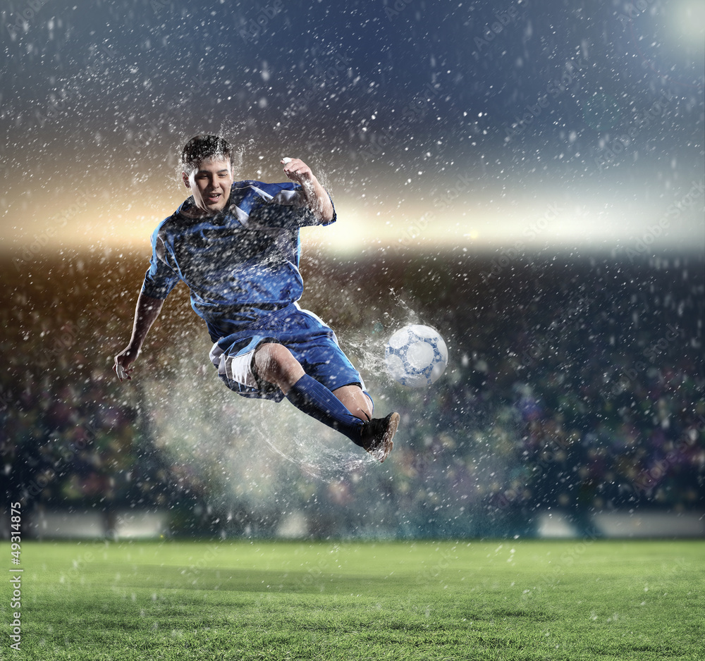 football player striking the ball football player striking the ball