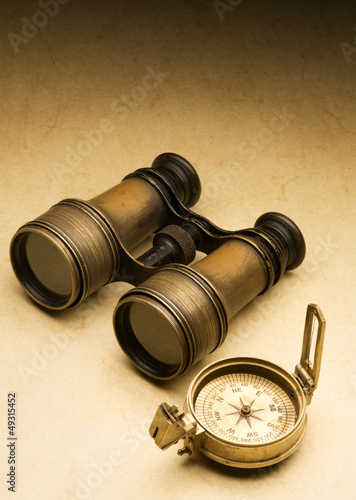 Ancient compass and binoculars