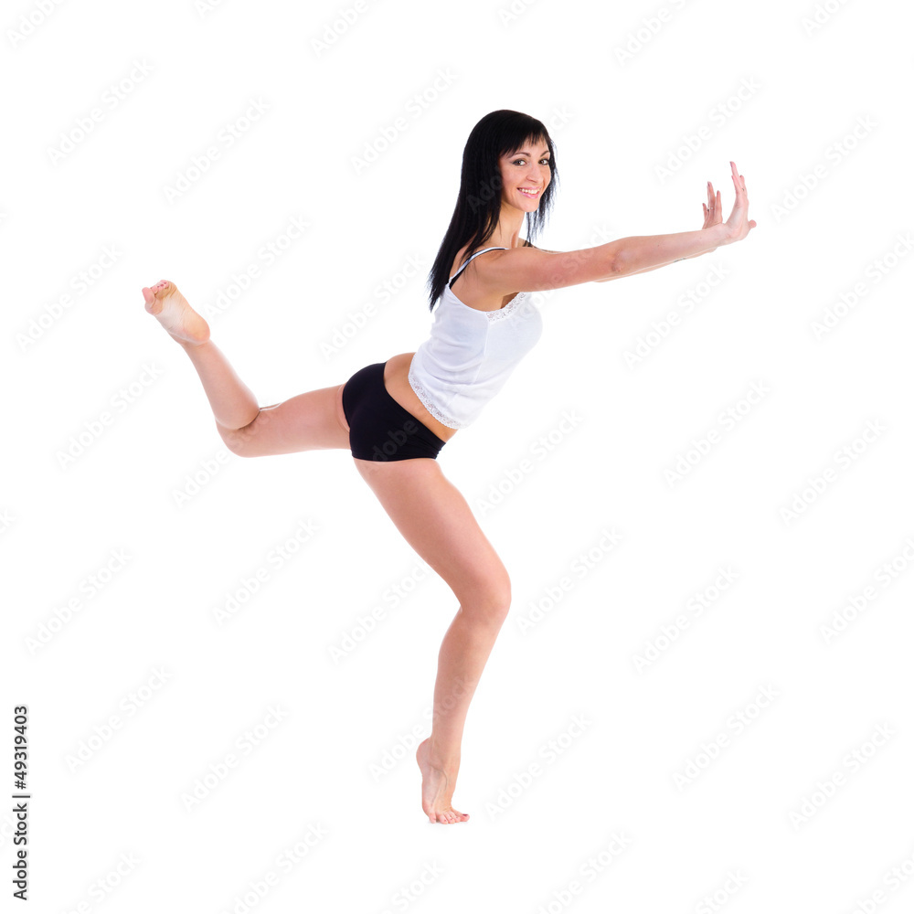 Young smiling fitness woman with holding gesture