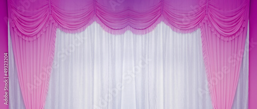 White and purple curtains on the wall  background