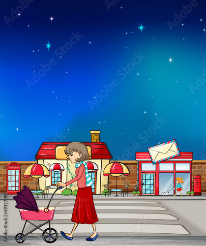 A woman walking along the road