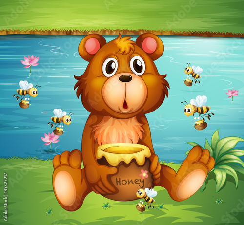 A bear and bees near the river