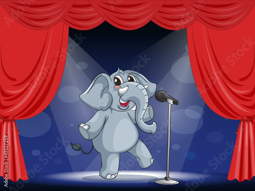 An elephant performing on the stage