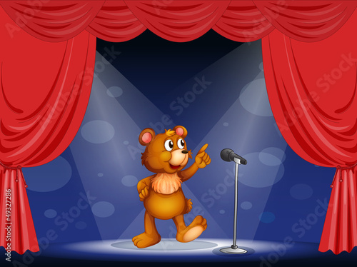 A bear performing on the stage