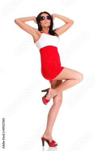 Happy surprised woman in red dress Isolated on © Voyagerix