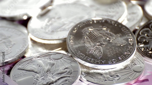 Spinning Silver Coins (macro video)