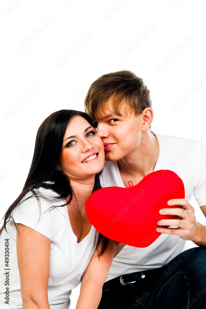 man gives a young and beautiful woman heart