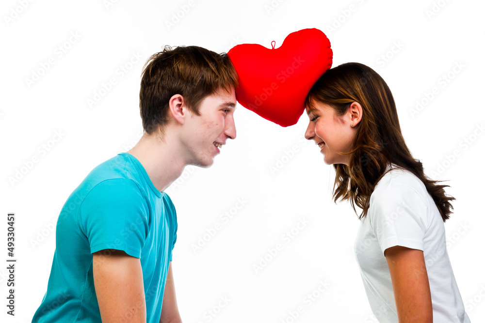 man gives a young and beautiful woman heart